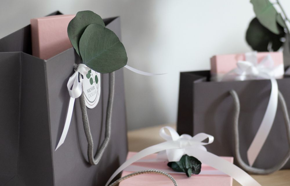 Create an unboxing moment with gift bags
