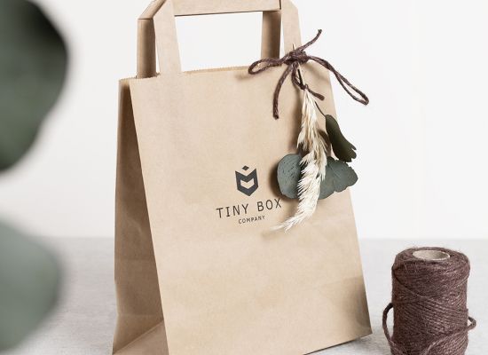 Create an unboxing moment with gift bags