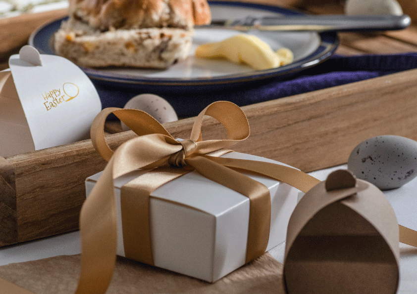 Printed corporate ribbon coordinated with gift boxes, tissue and branded inserts.