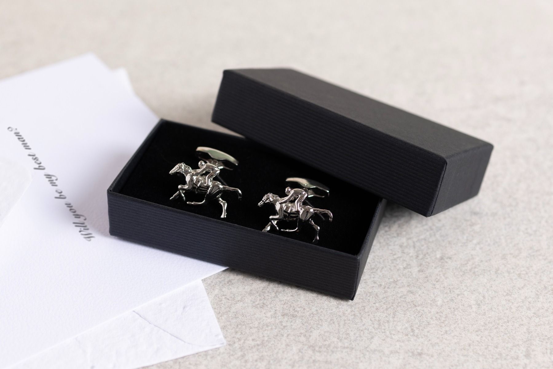 Small jewellery boxes stacked neatly with square corners