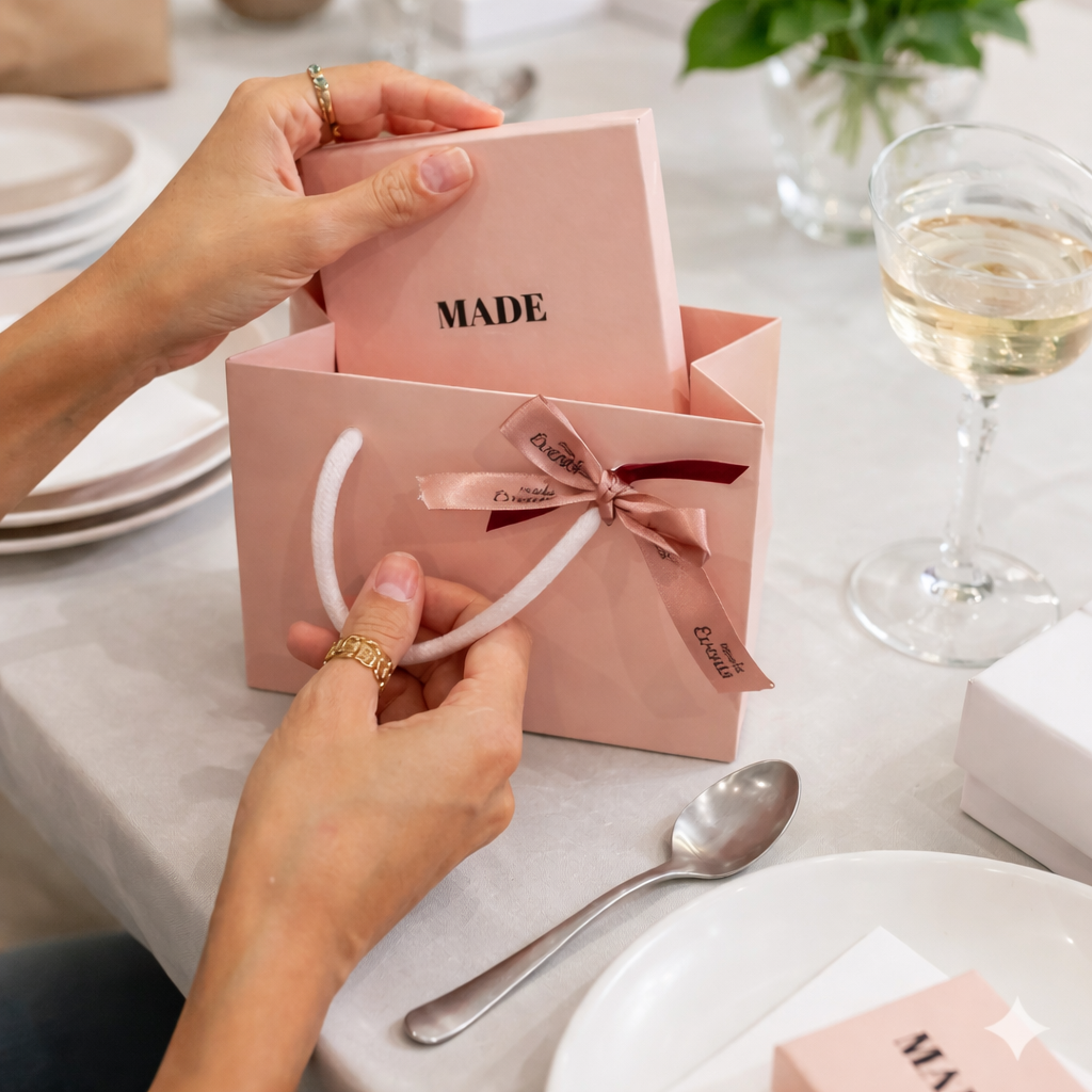 Close-up of custom printed ribbon showing brand colour and print detail.