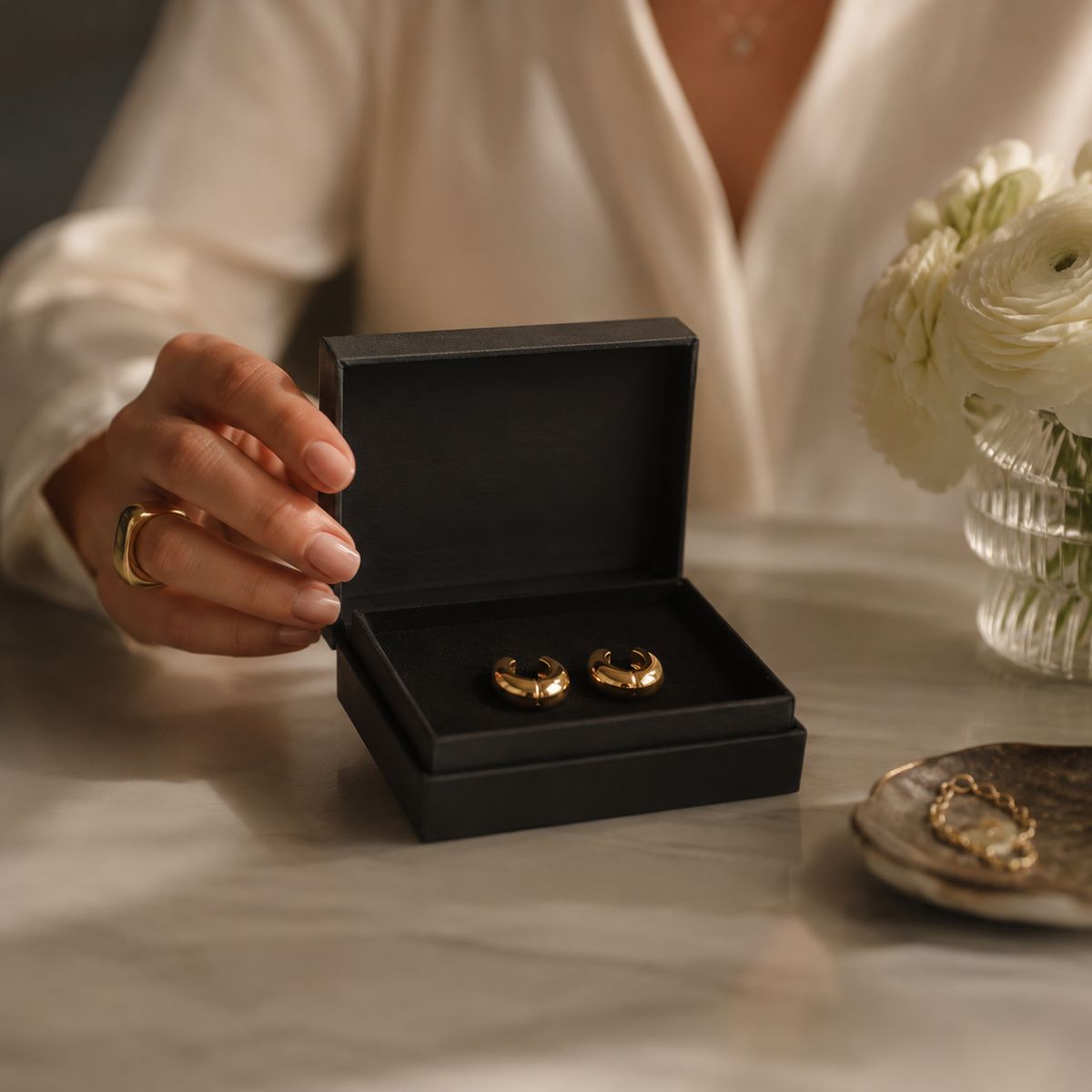 Earring and stud box with neatly aligned jewellery pair