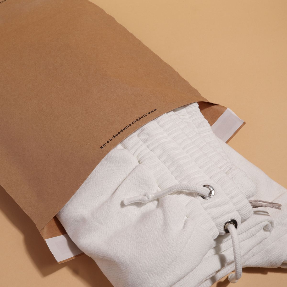 Returns ready paper mailing bag with label zone and reseal instructions
