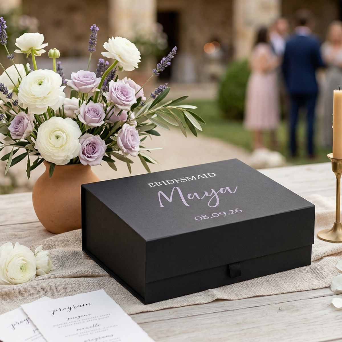 Different bridesmaid gift items styled inside magnetic boxes