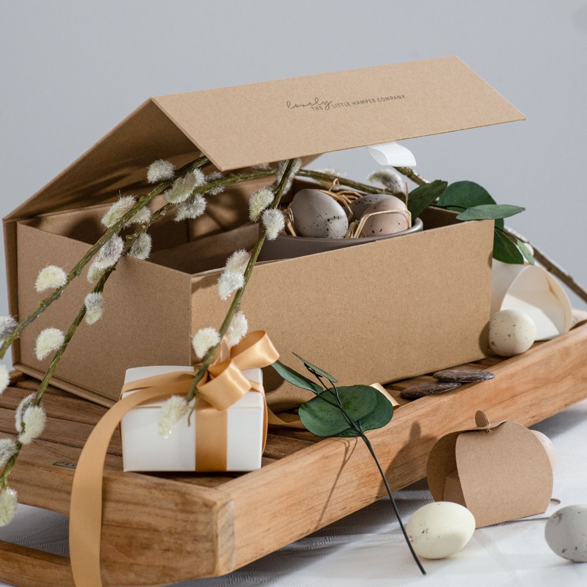 Close-up of a magnetic gift box lid showing material layers between magnetic components.