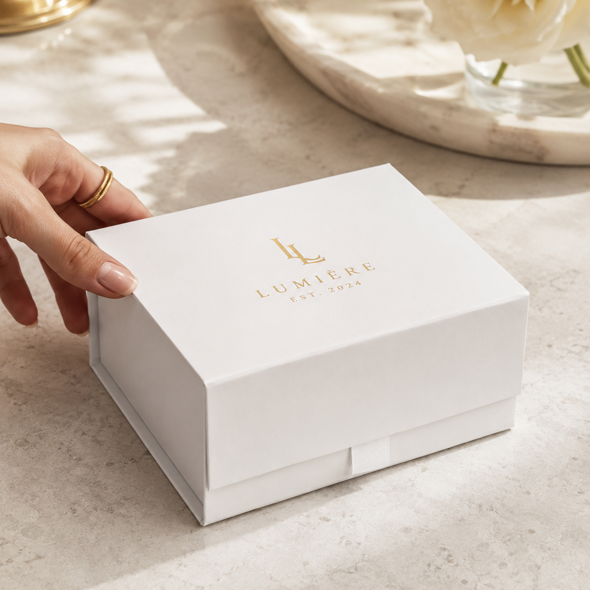 Packed technology product inside a shoulder-style magnetic gift box ready for distribution testing.